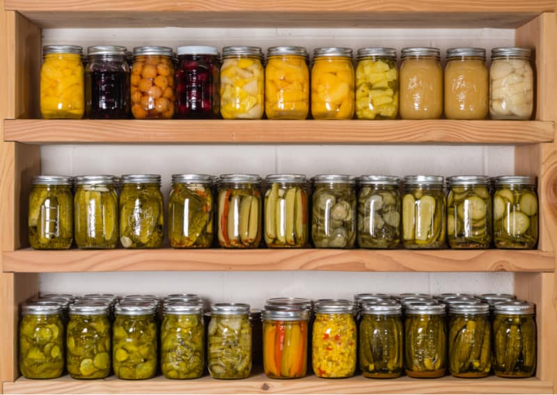 Jars of Canned Produce on Shelves