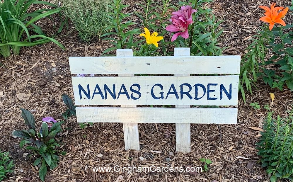 Nana's Garden sign in a flower garden