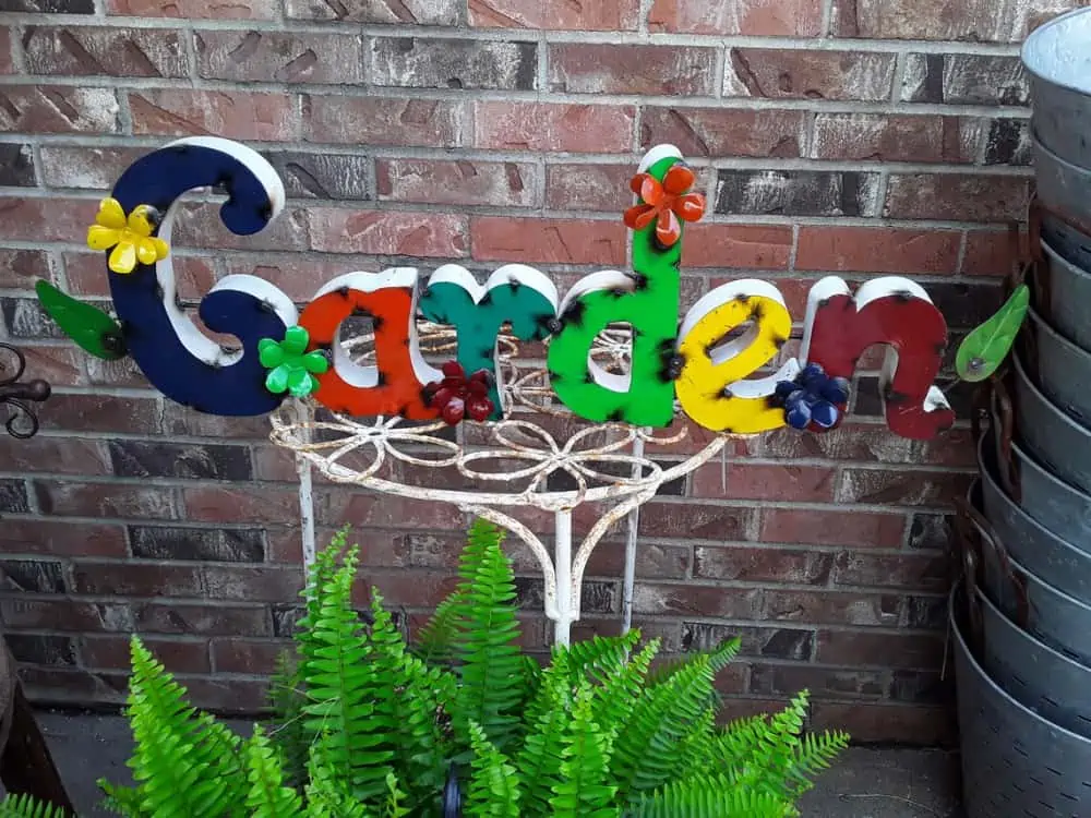 Garden sign with bright letters spelling out garden