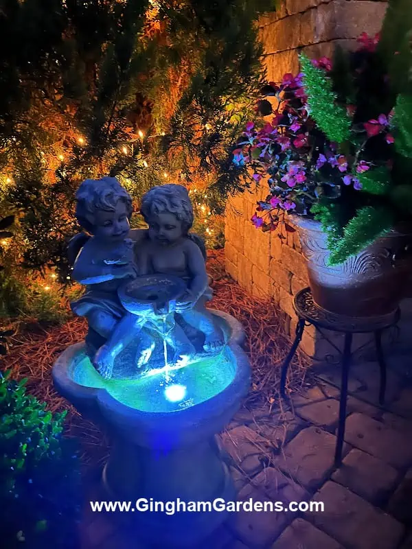 Fountain in a nighttime garden